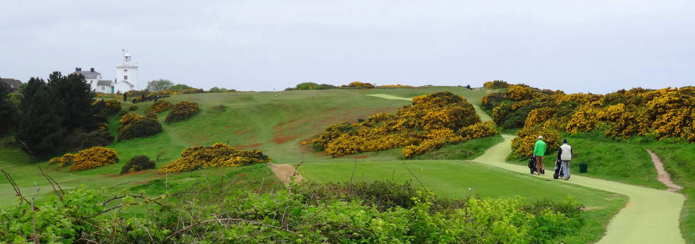 Golfbaan en vuurtoren van Overstand aan de Norfolk Coast, Engeland